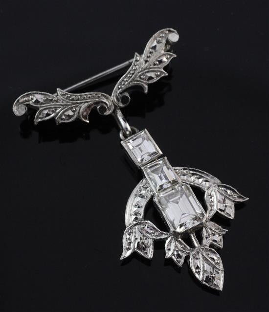 A mid 20th century platinum and diamond drop pendant brooch, 1.5in overall.